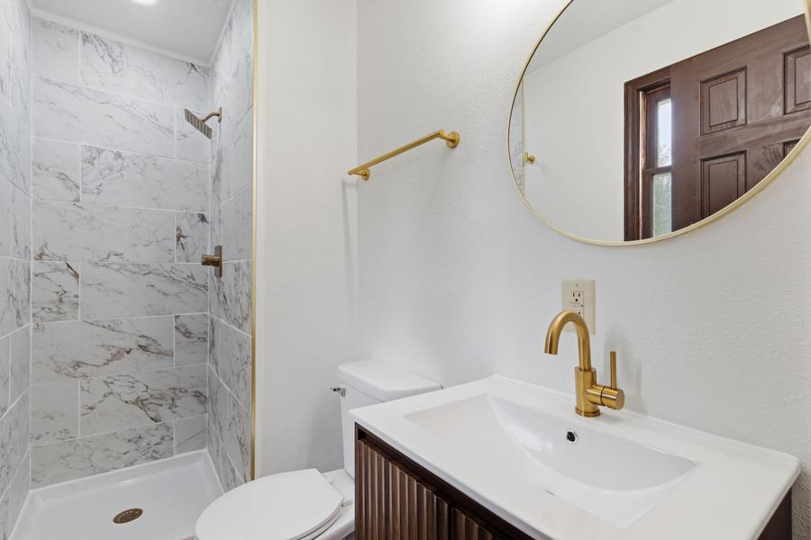 Bath, vanity and shower